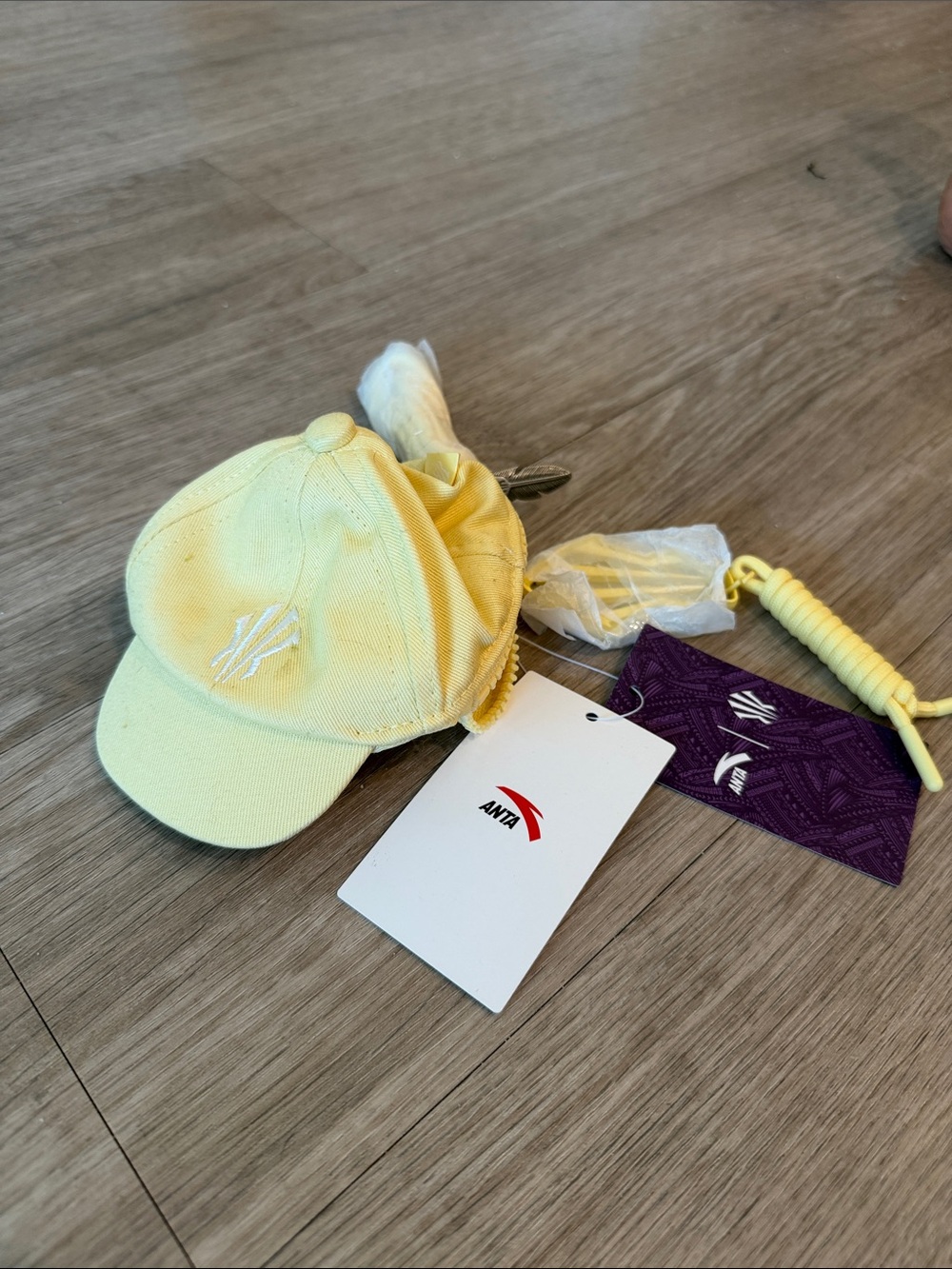 ANTA Yellow Baseball Cap with Embroidered Logo